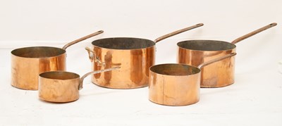 Lot 338 - Graduated set of five copper saucepans with iron handles