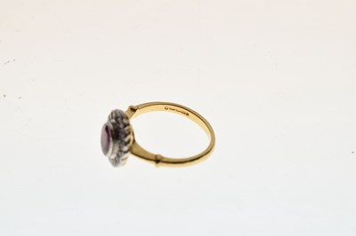 Lot 32 - 18ct gold, ruby and diamond cluster ring