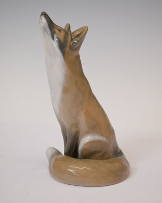 Lot 558 - Royal Copenhagen - Small porcelain figure of a fox, 1475