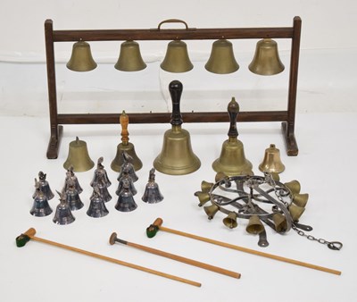 Lot 484 - Set of five bells suspended on wooden stand and other bells