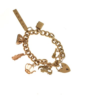 Lot 113 - 9ct gold curb link charm bracelet