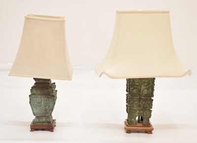 Lot 590 - Two Chinese bronze lamps