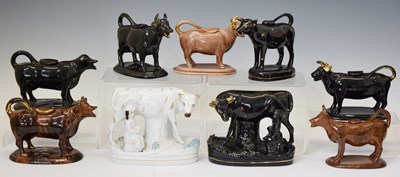 Lot 512 - Group of Staffordshire cow creamers