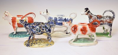 Lot 515 - Five Staffordshire cow creamers