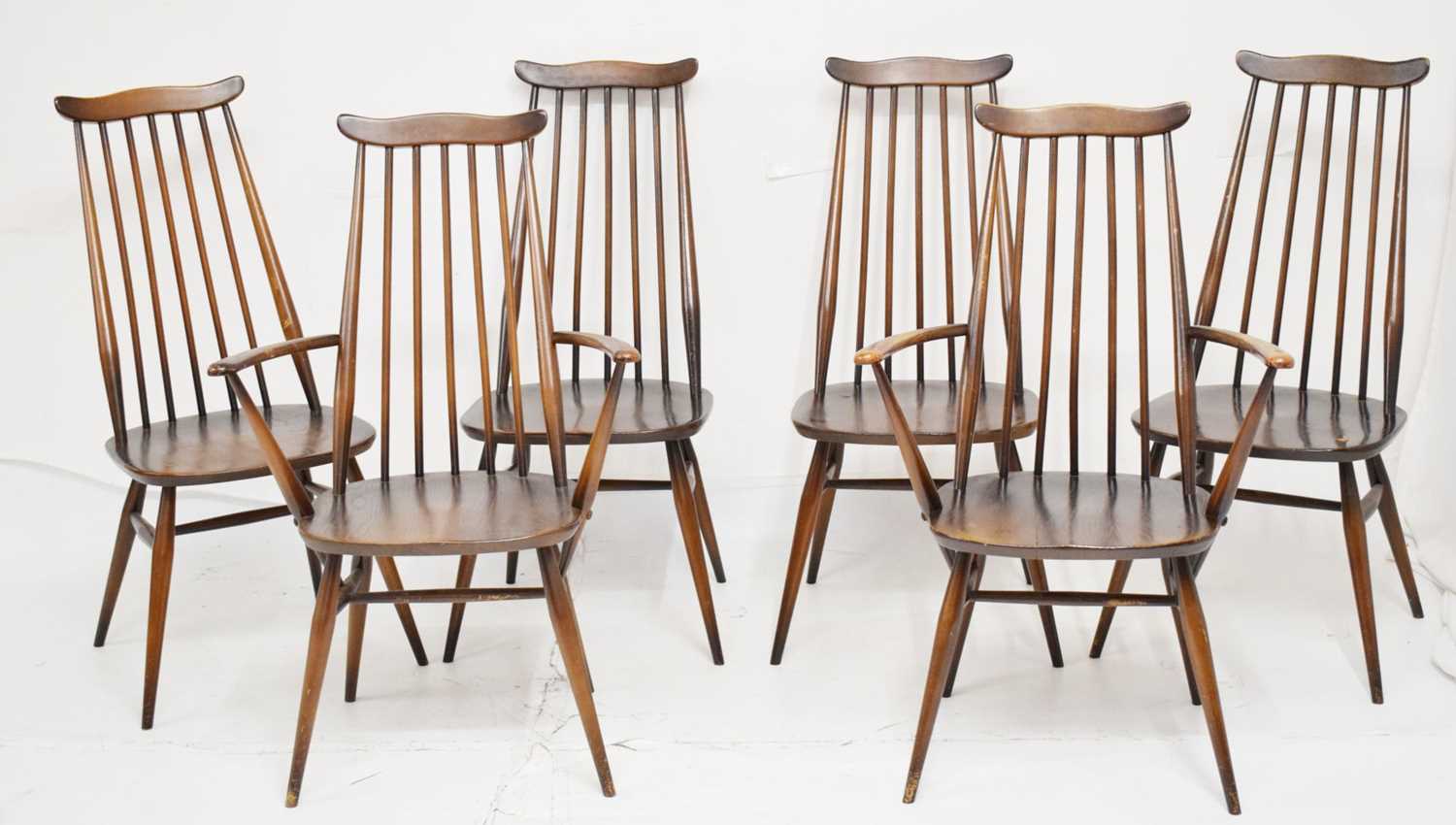 Lot 695 - Ercol - Set of six Goldsmith Windsor stick back dining chairs