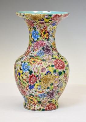 Lot 293 - Chinese Canton Famille Rose porcelain 'Thousand Flowers' vase, Qianlong mark (a/f)