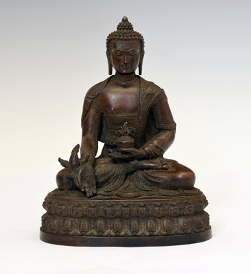 Lot 302 - Good Sino-Tibetan patinated bronze 'Medicine Buddha' (Bhaishajyaguru)