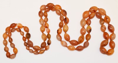 Lot 85 - 'Peach agate' beaded necklace