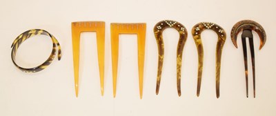 Lot 328 - Group of 20th century tortoiseshell inlaid hair slides