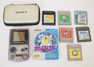 Lot 446 - Game Boy Color console and Pokémon games