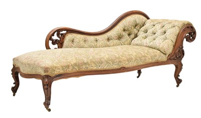 Lot 770 - Victorian walnut deep button back chaise longue