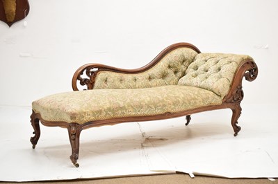 Lot 770 - Victorian walnut deep button back chaise longue