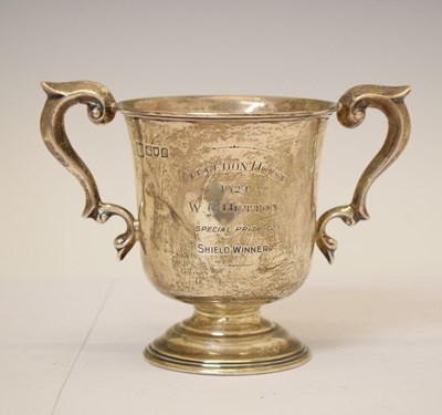 Lot 253 - George V silver twin handled trophy cup with presentation inscription