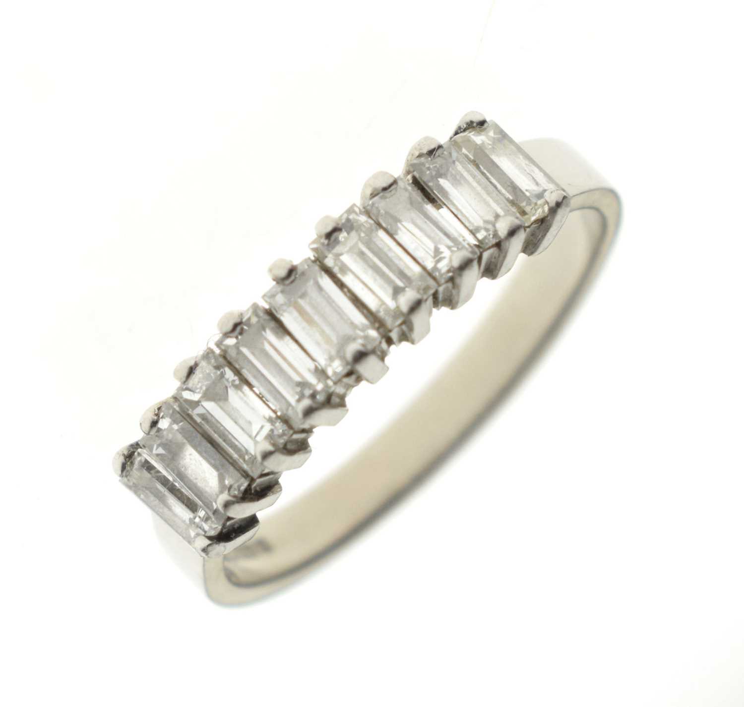 Lot 12 - 18ct white gold ring set nine baguette-cut