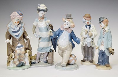 Lot 565 - Lladro - Five porcelain clown figures