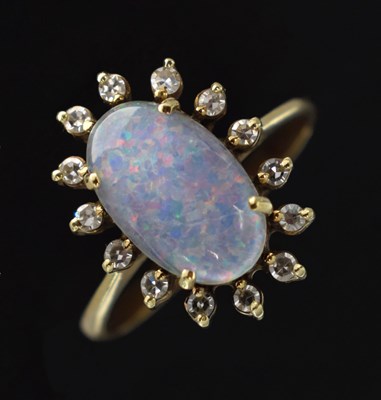 Lot 36 - Opal triplet and diamond cluster ring