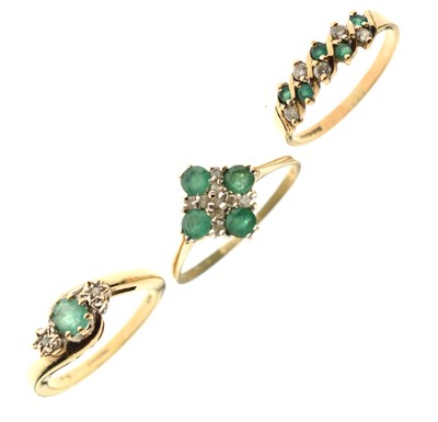 Lot 63 - Three 9ct gold emerald dress rings