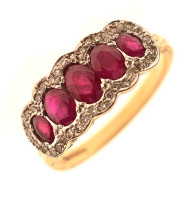 Lot 17 - 18ct gold ruby and diamond cluster ring