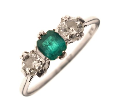 Lot 16 - Emerald and diamond platinum three-stone ring