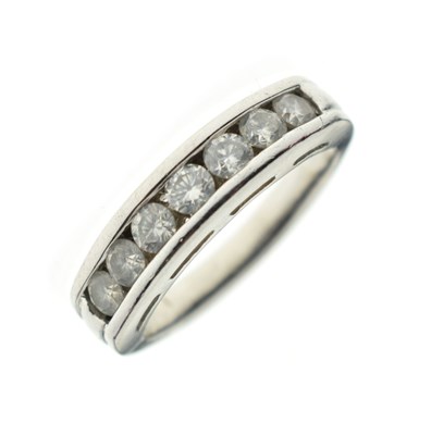 Lot 8 - Seven-stone diamond half eternity ring