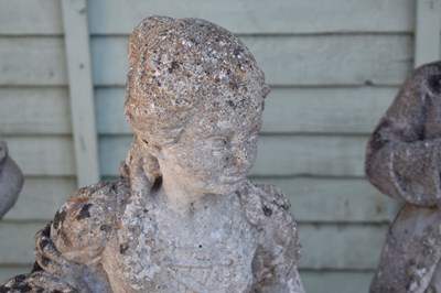 Lot 808 - Three composition stone garden statues