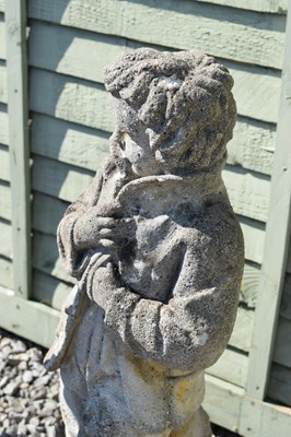 Lot 808 - Three composition stone garden statues