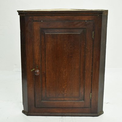 Lot 728 - George III oak corner cupboard