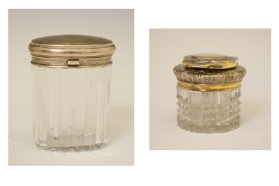 Lot 246 - Two Victorian silver mounted glass jars