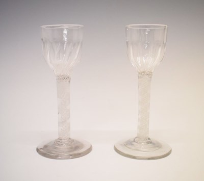 Lot 369 - Pair of 18th Century opaque twist wine glasses