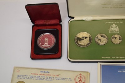 Lot 303 - Collection of world coinage to include Canadian dollars, Guyana proof set, etc