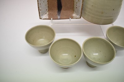 Lot 354 - Leach Pottery mead jug and four cups and Janet Leach dish