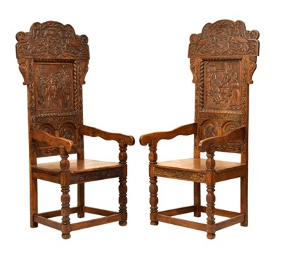 Lot 592 - Pair of carved oak chairs - Charles and William