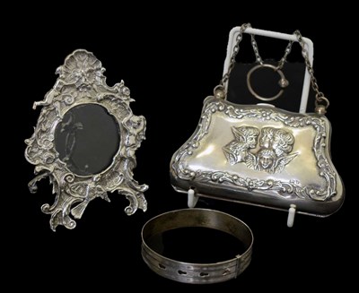 Lot 228 - Edward VII silver purse, Elizabeth II cast silver rococo style photo frame, etc