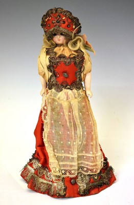 Lot 520 - Early 20th century Russian-style bisque-head doll