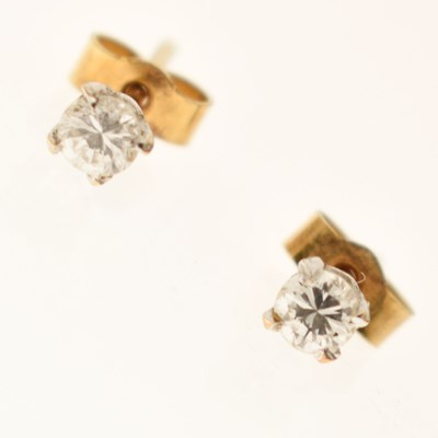 Lot 148 - Pair of diamond single stone 18ct gold earrings