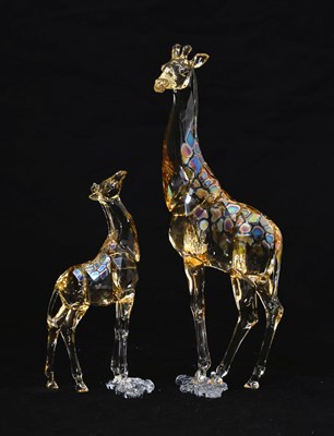 Lot 565 - Swarovski Crystal Collector's Society Giraffe Mudiwa 2018, and a Swarovski giraffe calf