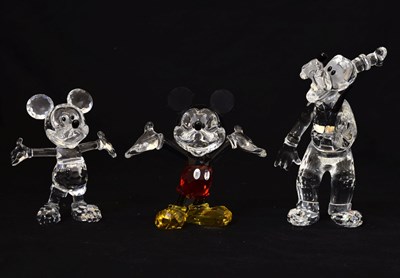 Lot 567 - Swarovski Crystal Mickey Mouse and Goofy, and a Swarovski Disney Elements Mickey Mouse