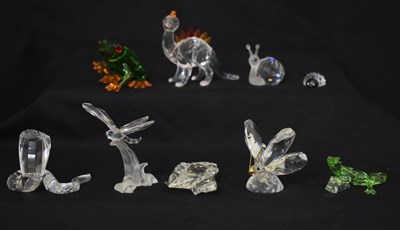 Lot 578 - Collection of nine Swarovski Crystal reptile, insect, dinosaur ornaments, etc