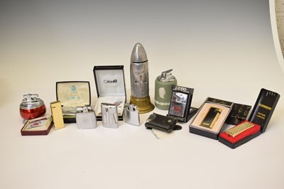 Lot 362 - Collection of lighters and Trench Art shell money box