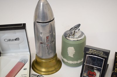 Lot 362 - Collection of lighters and Trench Art shell money box