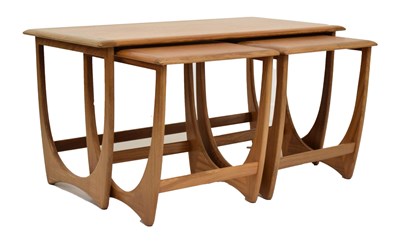 Lot 698 - Victor B. Wilkins for G-Plan - Nest of three teak 'Astro' design coffee tables