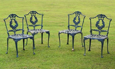 Lot 805 - Set of four blue painted cast aluminium garden patio chairs