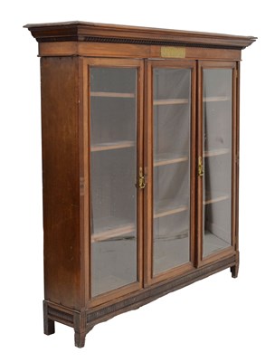 Lot 725 - Late 19th century mahogany three-glazed door bookcase