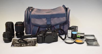 Lot 530 - Canon A-1 camera and lenses