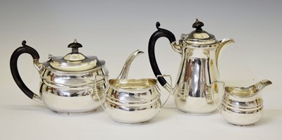 Lot 256 - George V silver four-piece tea service