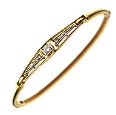 Lot 139 - 14ct gold diamond set snap bangle