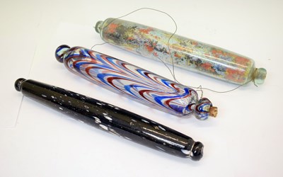 Lot 540 - Three 19th century Nailsea-type glass rolling pins