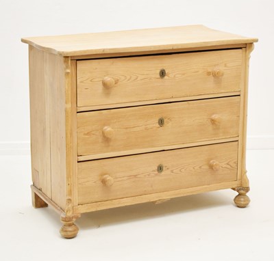 Lot 776 - Pine chest of three long drawers with serpentine shaped top