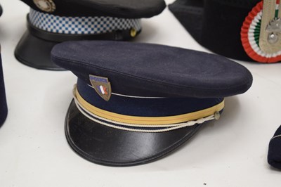Lot 319 - Collection of mid to late 20th century Foreign Police caps etc