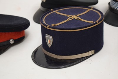 Lot 319 - Collection of mid to late 20th century Foreign Police caps etc